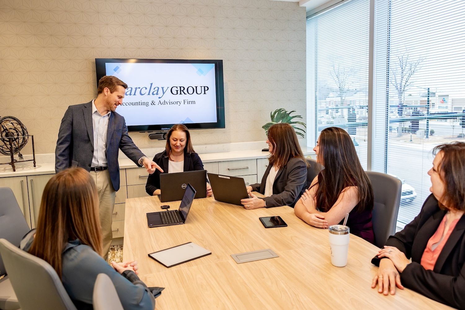 the Barclay team in the office