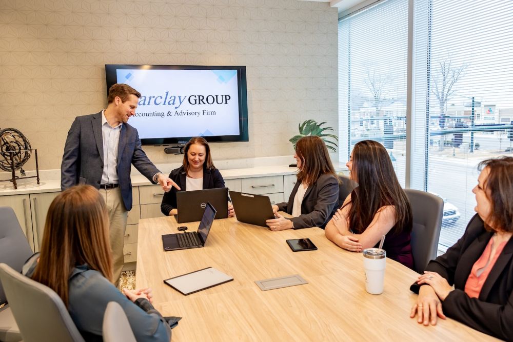 the Barclay team in the office